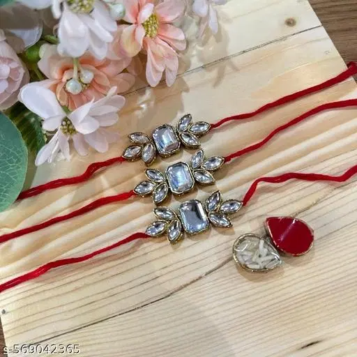 Alloy Designer Couple Rakhi, White, Set Of 1