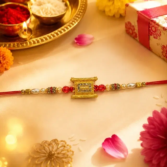 Elegant Golden Red Rakhi for Brother
