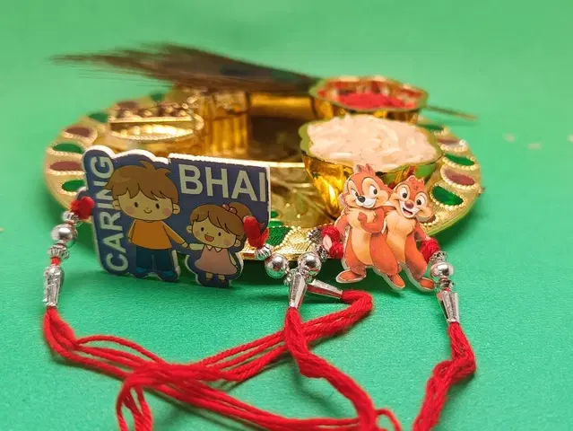 Synthetic 2 Pcs Rakhi with 4.5 Inch Plate & Greeting card, Roli (Multicolor, Set of 1)