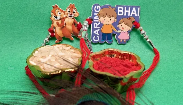 Synthetic 2 Pcs Rakhi with Greeting Card & Roli Chawal (Multicolor, Set of 1)