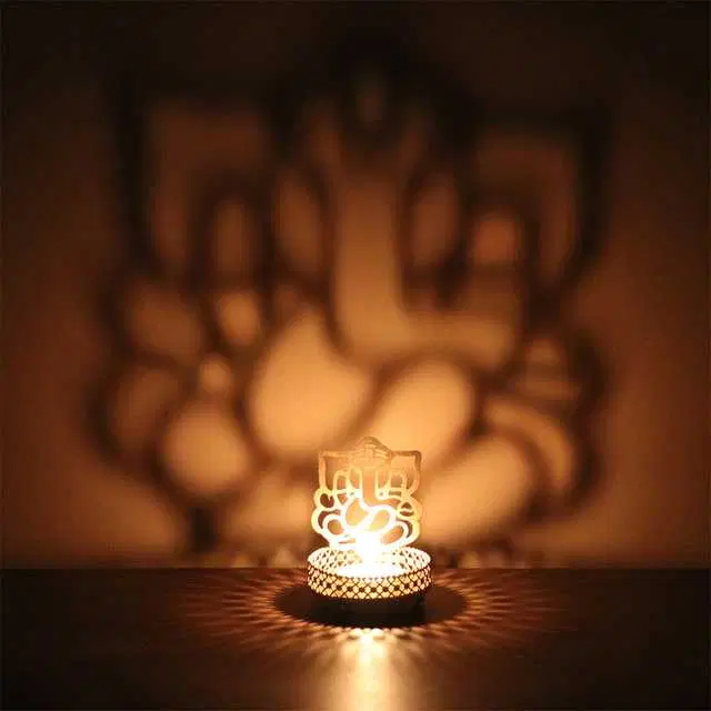 Divine Shadow Metal Ganesh Tealight Holder, Golden, 4.5 X 3 X 4.5Inches, Du-001