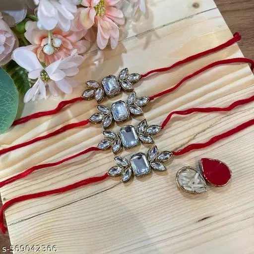 Alloy Designer Couple Rakhi, White, Set Of 1